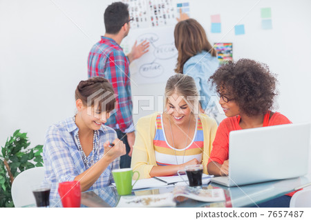 Designers having a brainstorm together Designers having a brainstorm together 7657487