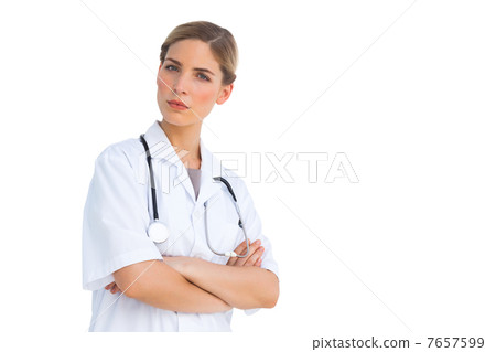 Serious nurse with arms crossed 7657599