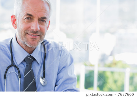 Portrait of a smiling doctor Portrait of a smiling doctor 7657600