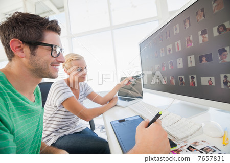 Photo editors working on photograph 7657831