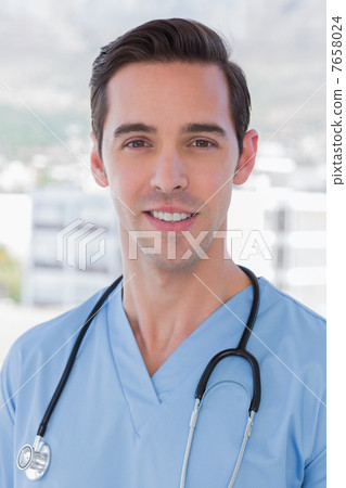 Practitioner standing in his office Practitioner standing in his office 7658024