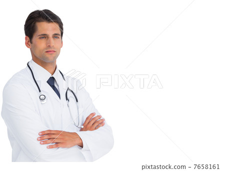 Serious doctor with arms crossed 7658161