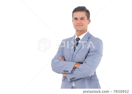 Smart businessman with arms crossed 7658932