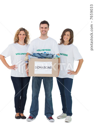 Group of volunteers holding donation box with clothes 7659033