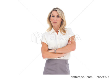 Angry businesswoman looking at the camera Angry businesswoman looking at the camera 7659924