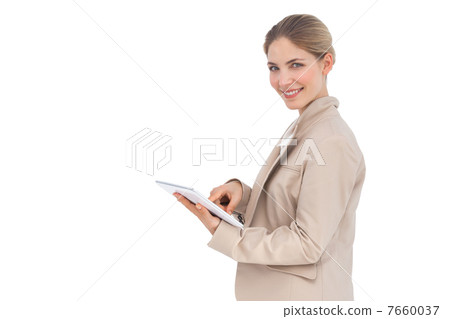 Smiling businesswoman with tablet pc 7660037