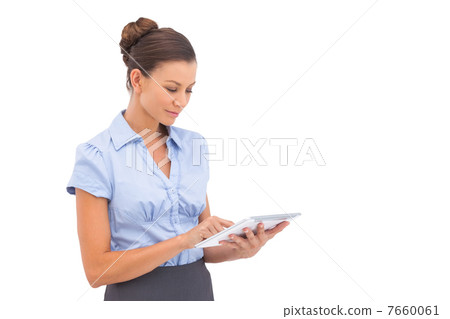 Businesswoman touching digital tablet 7660061