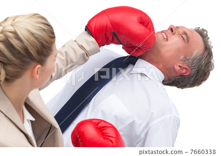 Businesswoman boxing her co worker 7660338