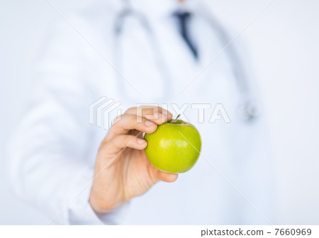 male doctor with green apple male doctor with green apple 7660969