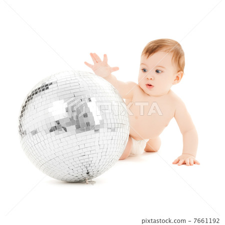 child playing with disco ball 7661192