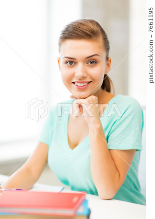 happy smiling student girl with books happy smiling student girl with books 7661195