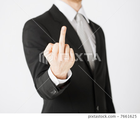man showing middle finger 7661625