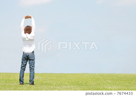 A man stretching out A man stretching out 7674433