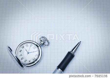 Pocket watch and ballpoint pen on notebook in cool blue tones. 7685136