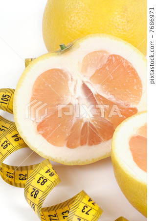 Grapefruit with centimetre. 7686971
