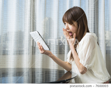 Amazing tablet and young lady Amazing tablet and young lady 7688003
