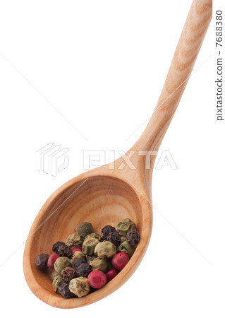 Pepper seasoning mix in wooden spoon isolated on white backgrou Pepper seasoning mix in wooden spoon isolated on white backgrou 7688380