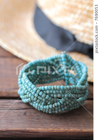 Light blue bead bracelet and straw hat - Summer image Light blue bead bracelet and straw hat - Summer image 7690053