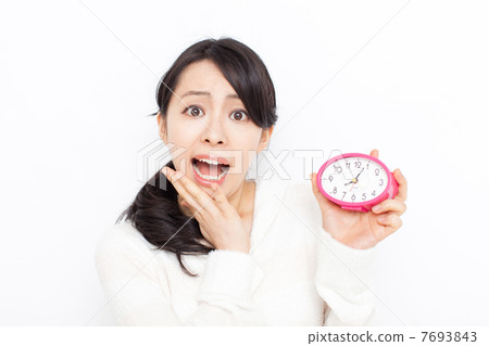 有鬧鐘的一名婦女 7693843