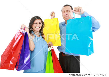 Couple at shopping ,the young woman it is very happy and laughin 7697421