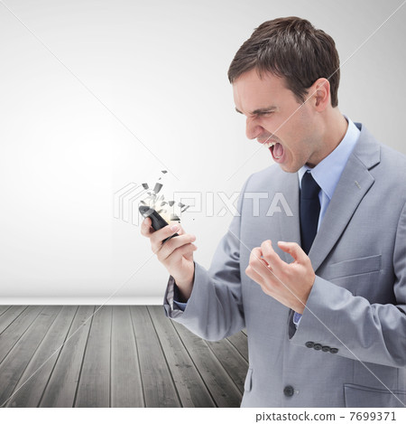 Furious businessman screaming Furious businessman screaming 7699371