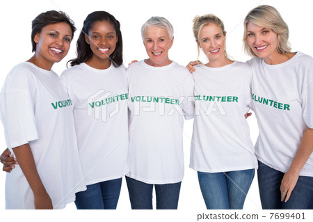 Group of female volunteers smiling at camera 7699401