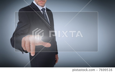 Businessman selecting a transparent screen Businessman selecting a transparent screen 7699516