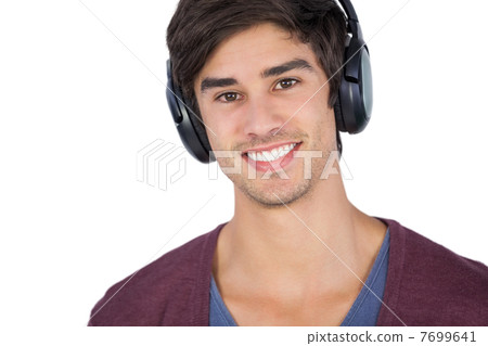 Handsome man listening music 7699641