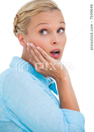 Surprised attractive blonde looking up 7699646