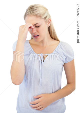 Young woman has a headache Young woman has a headache 7699725