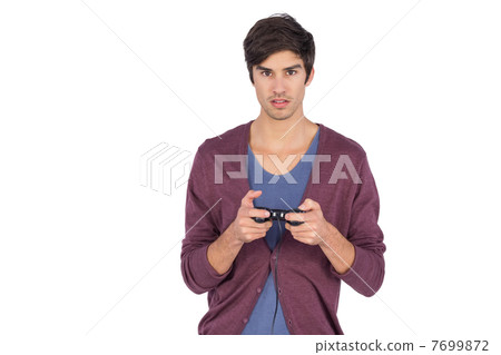 Young man concentrated on video games Young man concentrated on video games 7699872