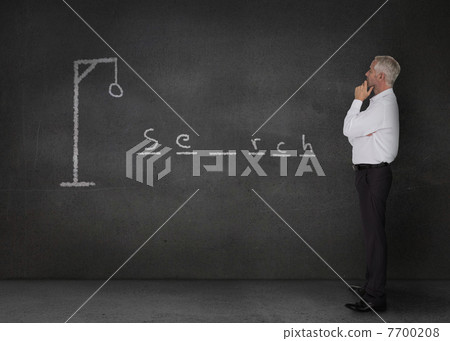 Businessman playing at hangman game 7700208