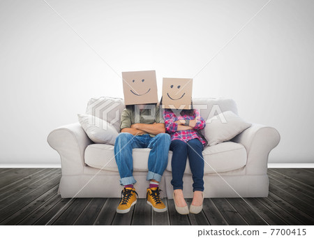 Funny couple wearing boxes on their head 7700415