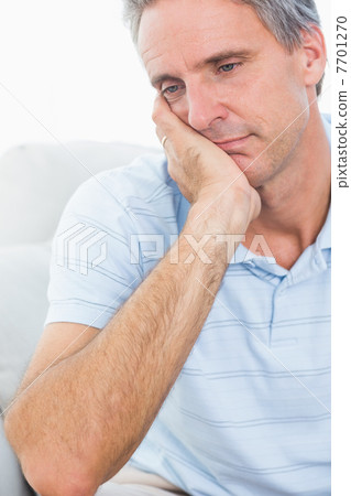 Upset man thinking 7701270