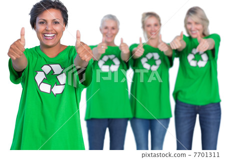 Happy women wearing green recycling tshirts giving thumbs up Happy women wearing green recycling tshirts giving thumbs up 7701311