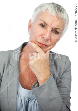 Thinking woman looking at camera Thinking woman looking at camera 7702272