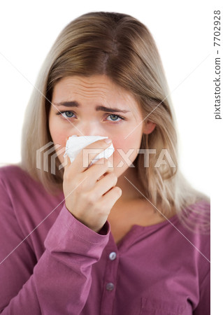 Woman using handkerchief Woman using handkerchief 7702928