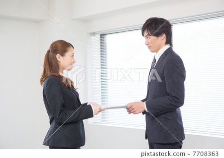 Junior who receives senior and hands documents Junior who receives senior and hands documents 7708363