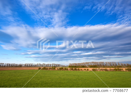 cloudscape over spring meadow cloudscape over spring meadow 7708677