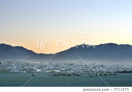 Mongolian village at sunset 7711975