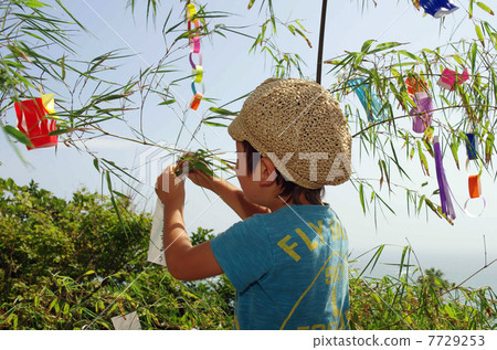 Bamboo decorations and children in Tanabata 7729253