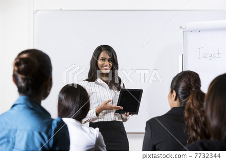 Indian Business woman giving presentation with Tablet 7732344
