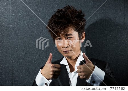 fashionable Asian man wearing stylish suit fashionable Asian man wearing stylish suit 7732562