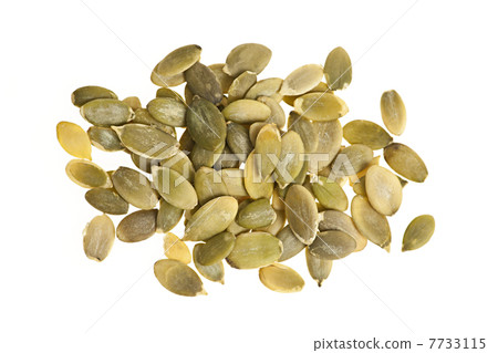 Pumpkin seeds on white 7733115