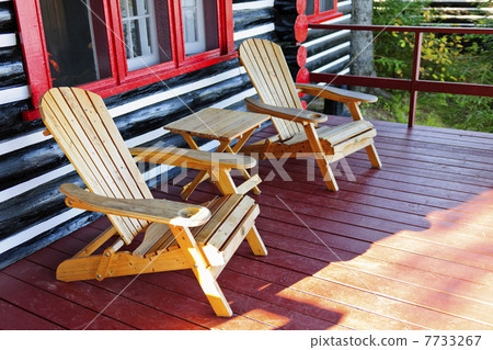 Log cabin porch with chairs Log cabin porch with chairs 7733267