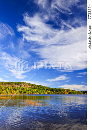 Fall forest and lake 7733354