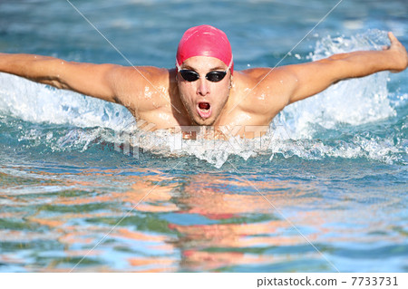 Swimmer athletic man swimming butterfly 7733731