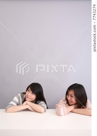Happy young female looking at copyspace 7743274