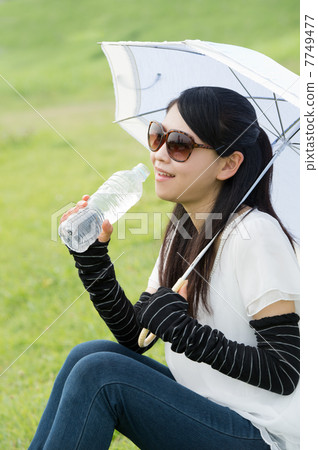 A woman with an arm cover 7749477