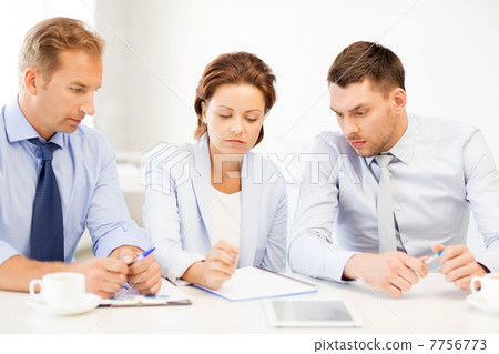 business team discussing something in office 7756773
